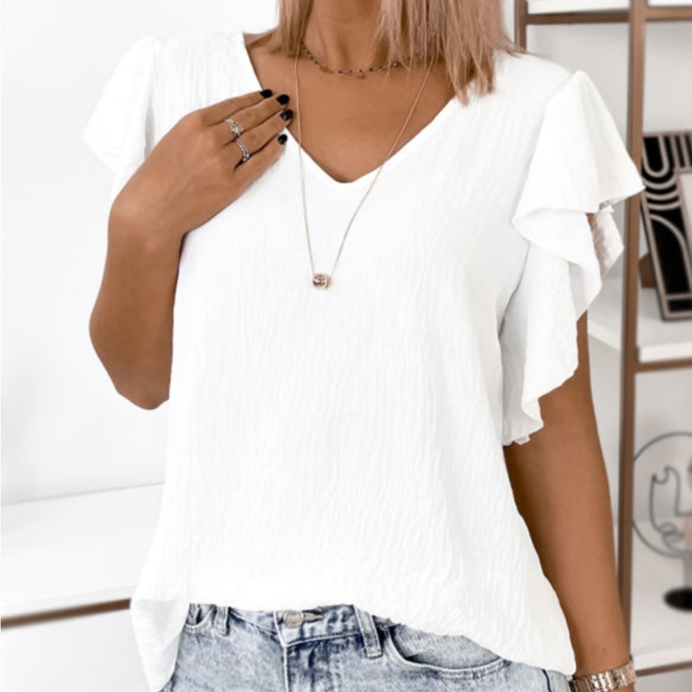 White top. New in package